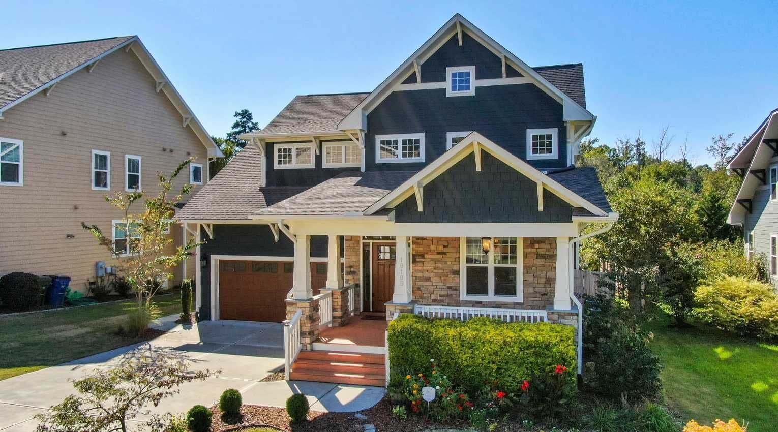 Modern home in grassy suburb